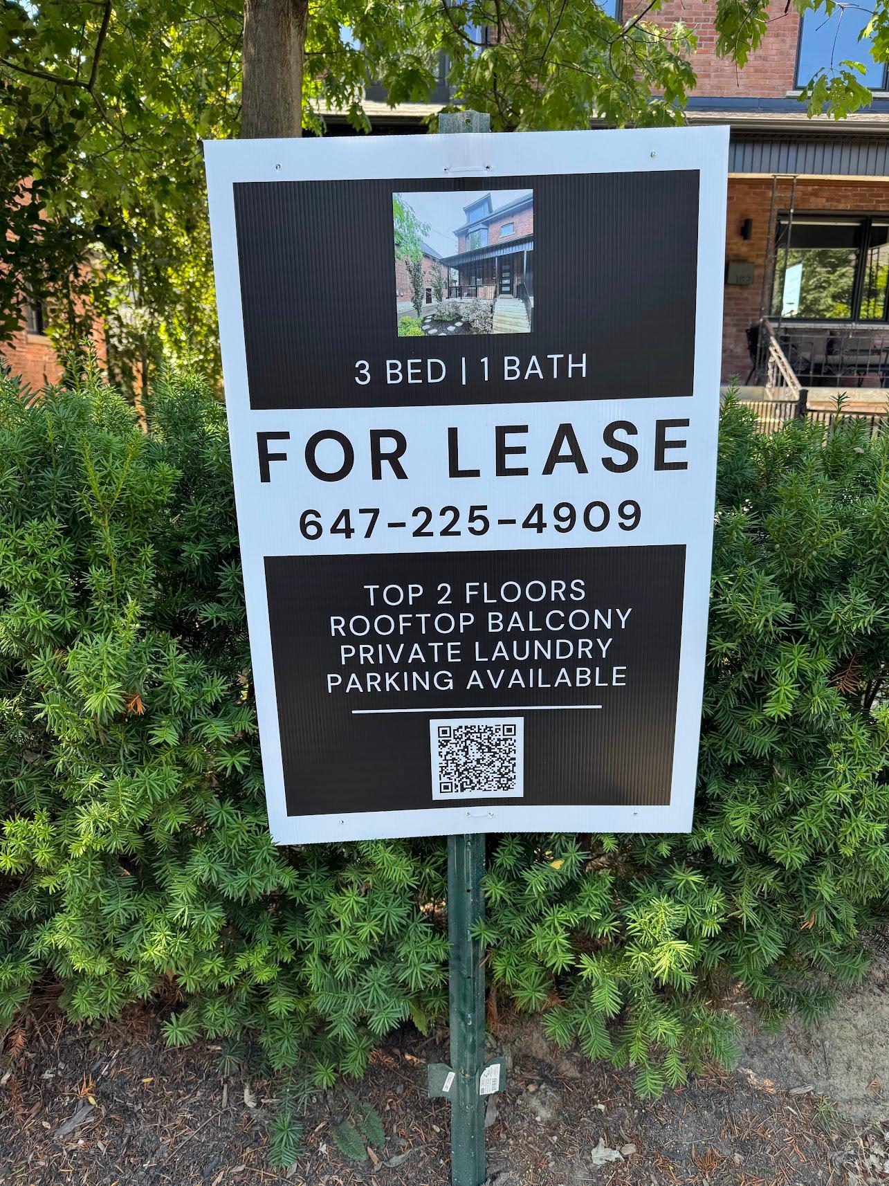 Andrew's real rental listing sign with QR code