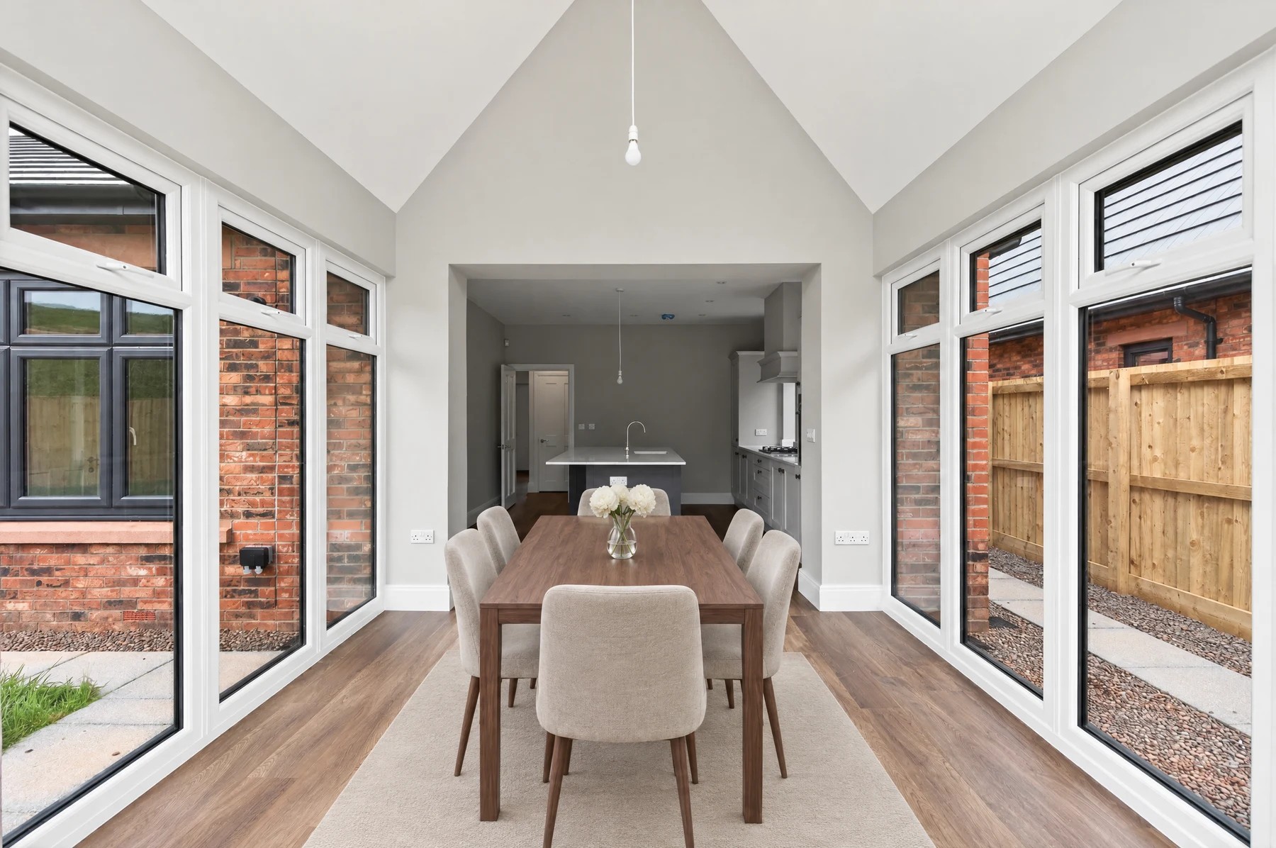 Dining room: virtually staged photo of the same room, angle 2
