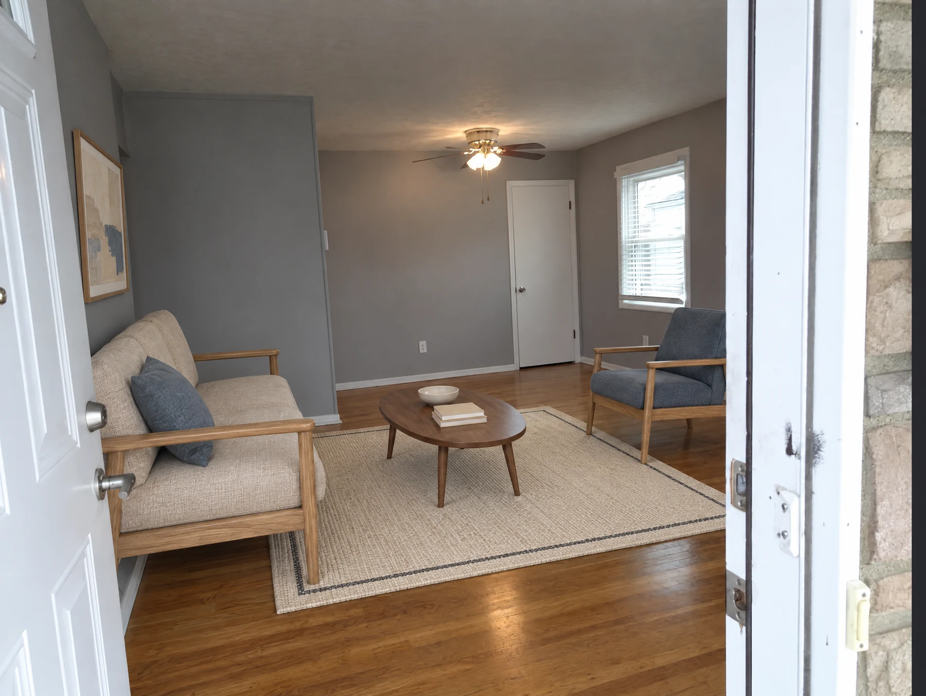 Living room, matching view, staged with ListingAI Precision Pro